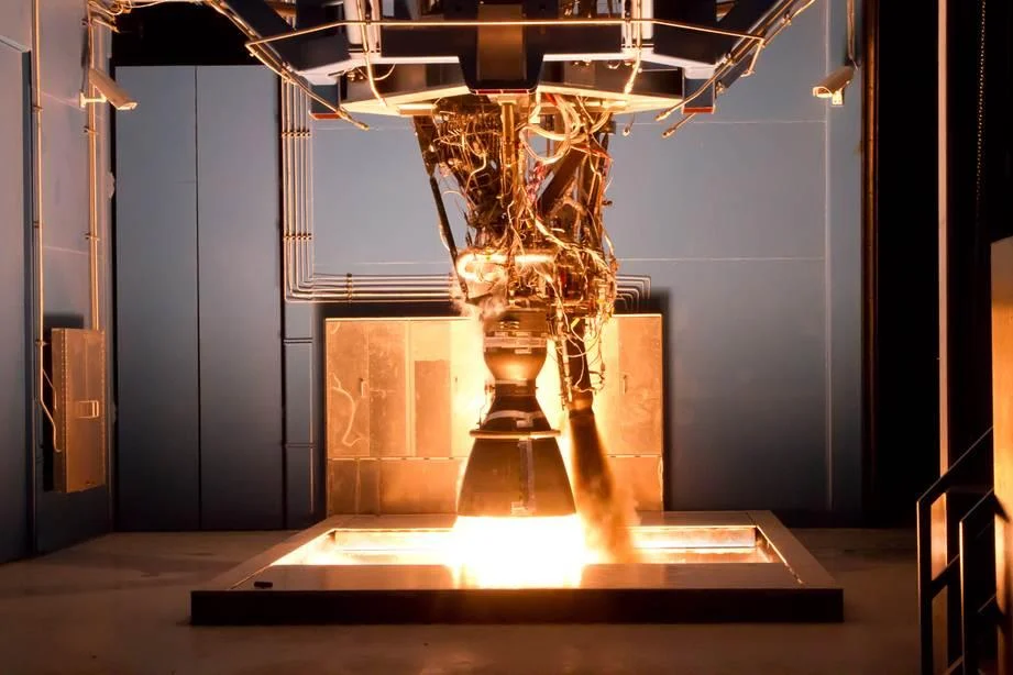 A Merlin 1D rocket engine firing on a ground test stand