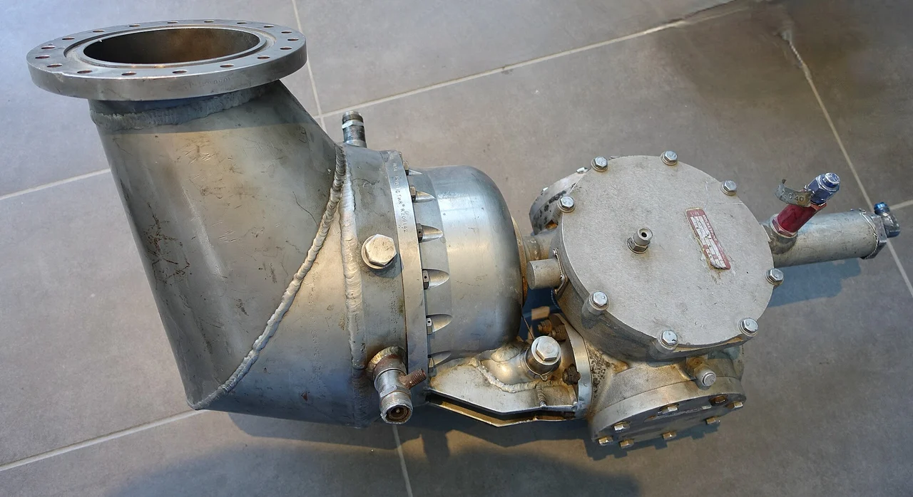 A gas-generator assembly from a Rocketdyne F-1 engine, photographed as a historical artifact